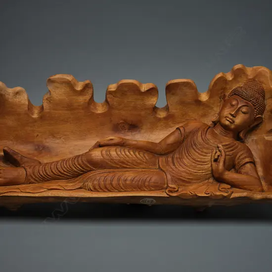 Modern Thai wooden reclining Buddha figure,
